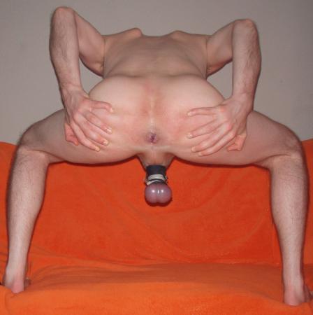 Stretching shaved asshole and tied balls